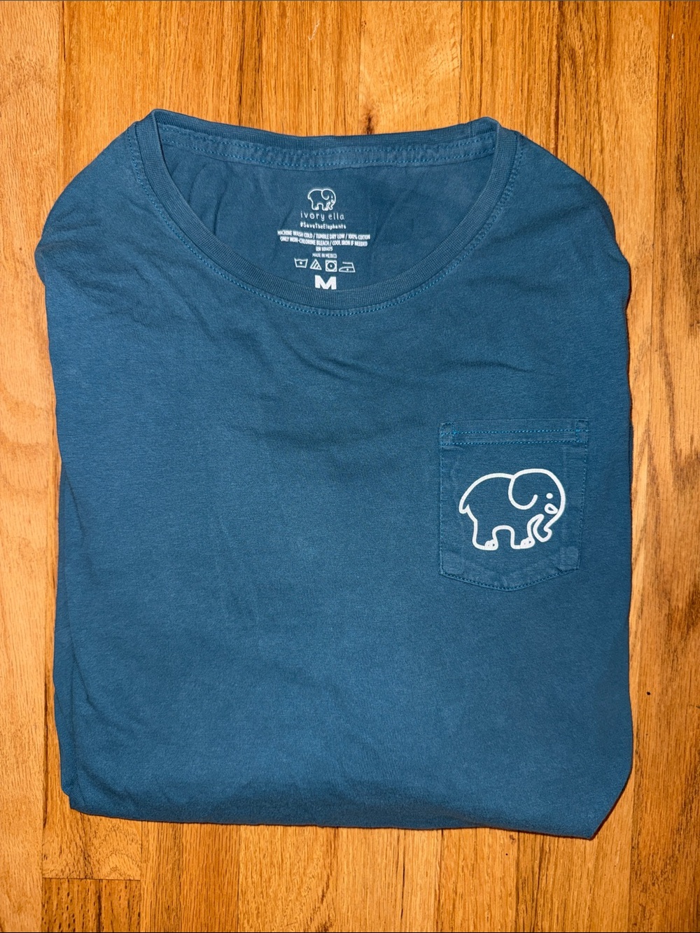Ivory Ella Blue Pocket long sleeve Tee with White Elephant Logo
